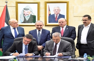 بمبادرة من أشتية... توقيع اتفاق ينهي أزمة ديون شركة كهرباء القدس