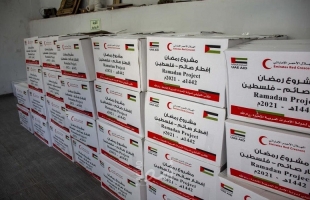 الهلال الأحمر الإماراتي يوزع آلاف الطرود الغذائية في فلسطين