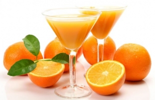 ما هى القيمة الغذائية لكوب من عصير البرتقال يوميا؟